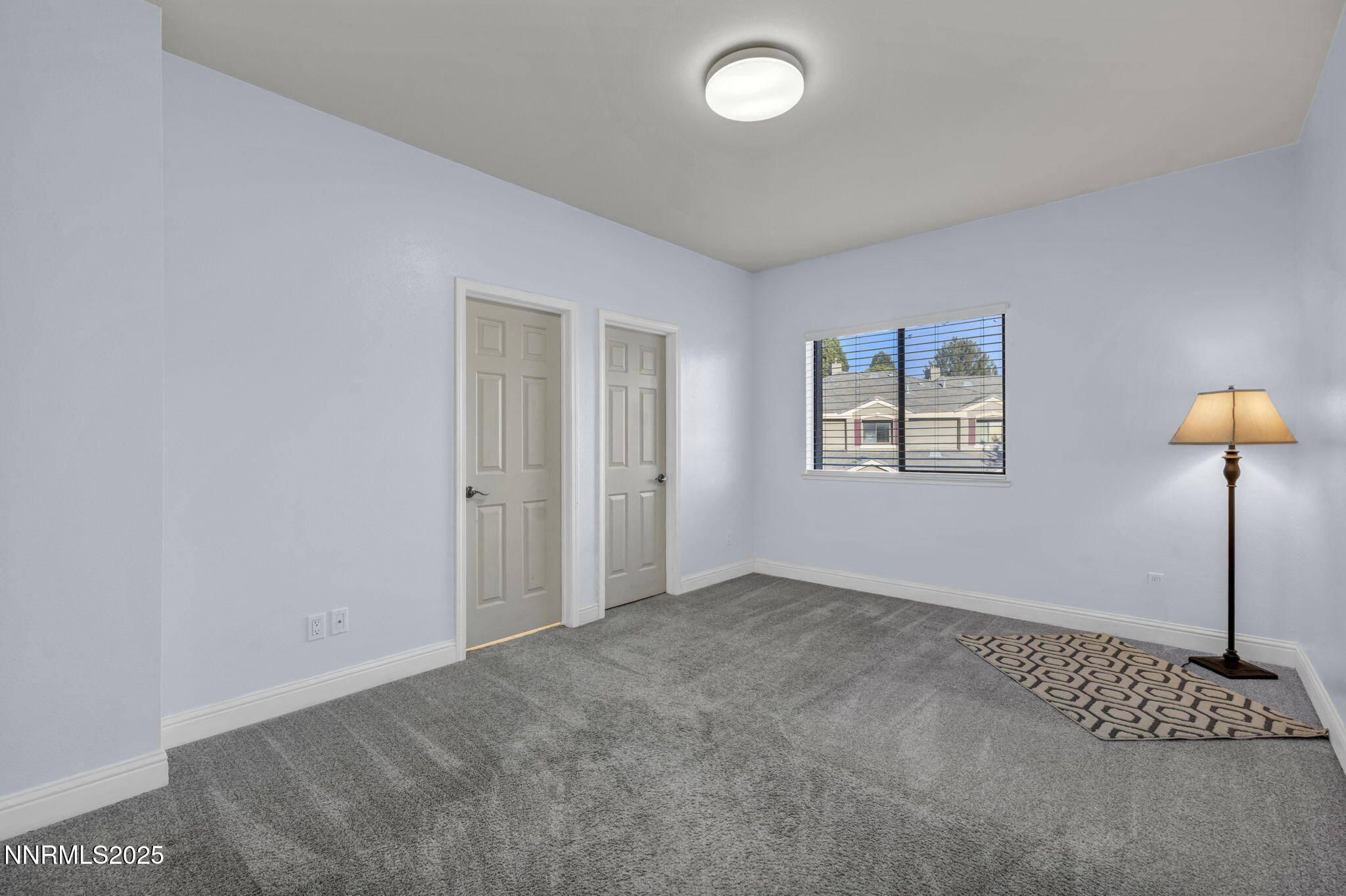 900 South Meadows Parkway, Unit 3223 Reno, NV 89521 - Photo 24 of 42 an empty room with windows