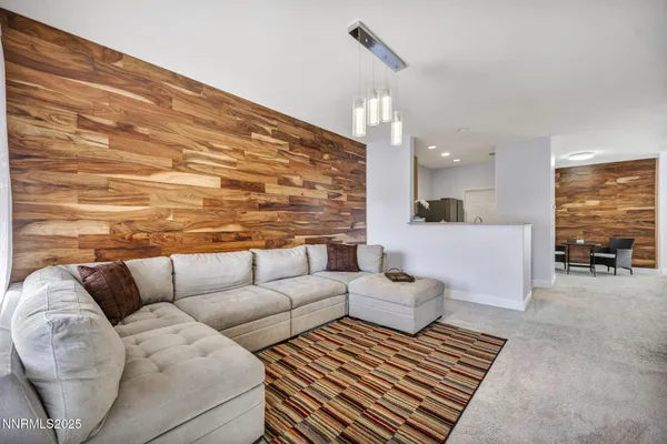 a kitchen with granite countertop a sink and a counter top space