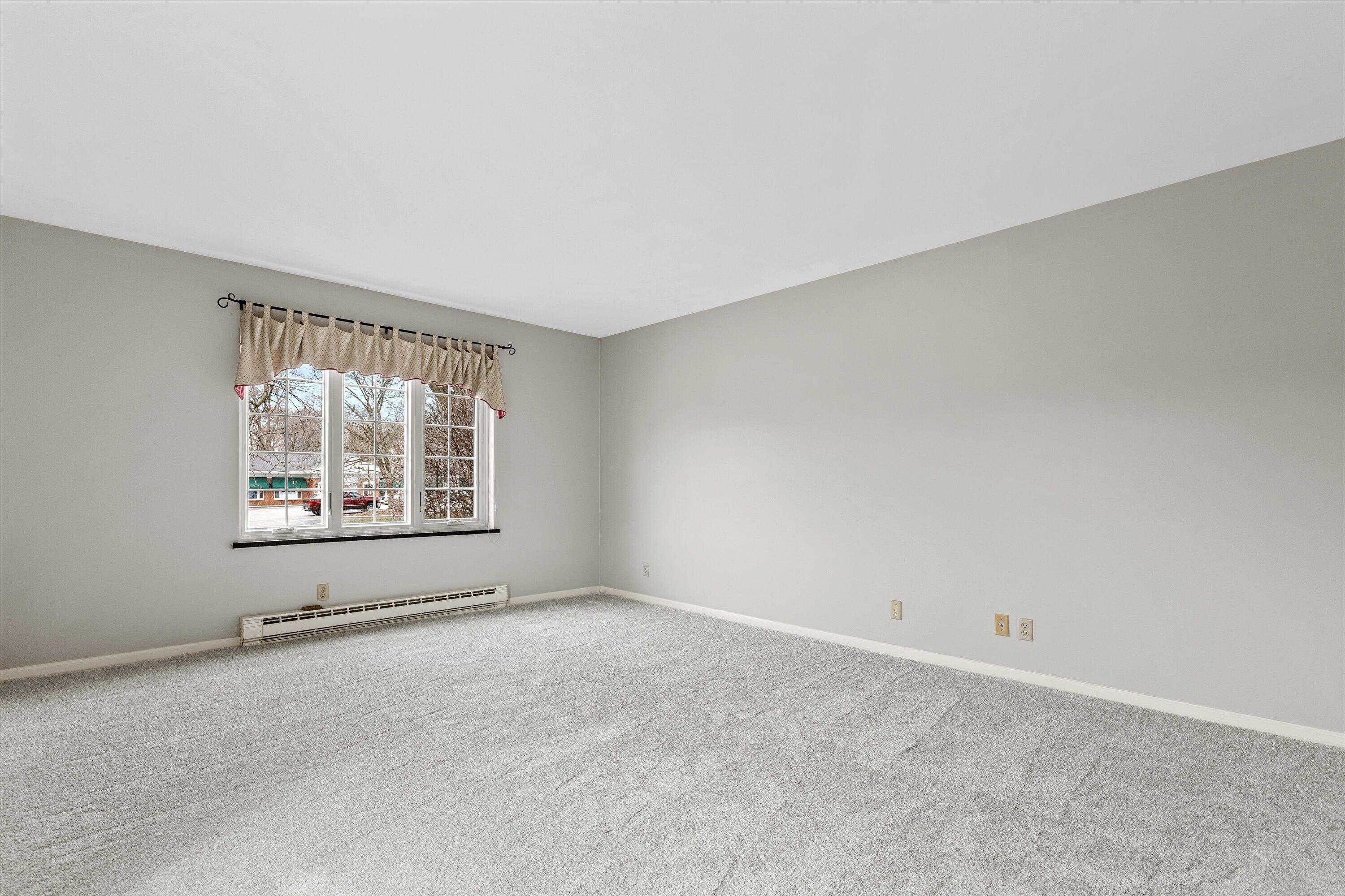 13335 Watertown Plank Road, Unit 105 Elm Grove, WI 53122 - Photo 14 of 37 Primary Bedroom