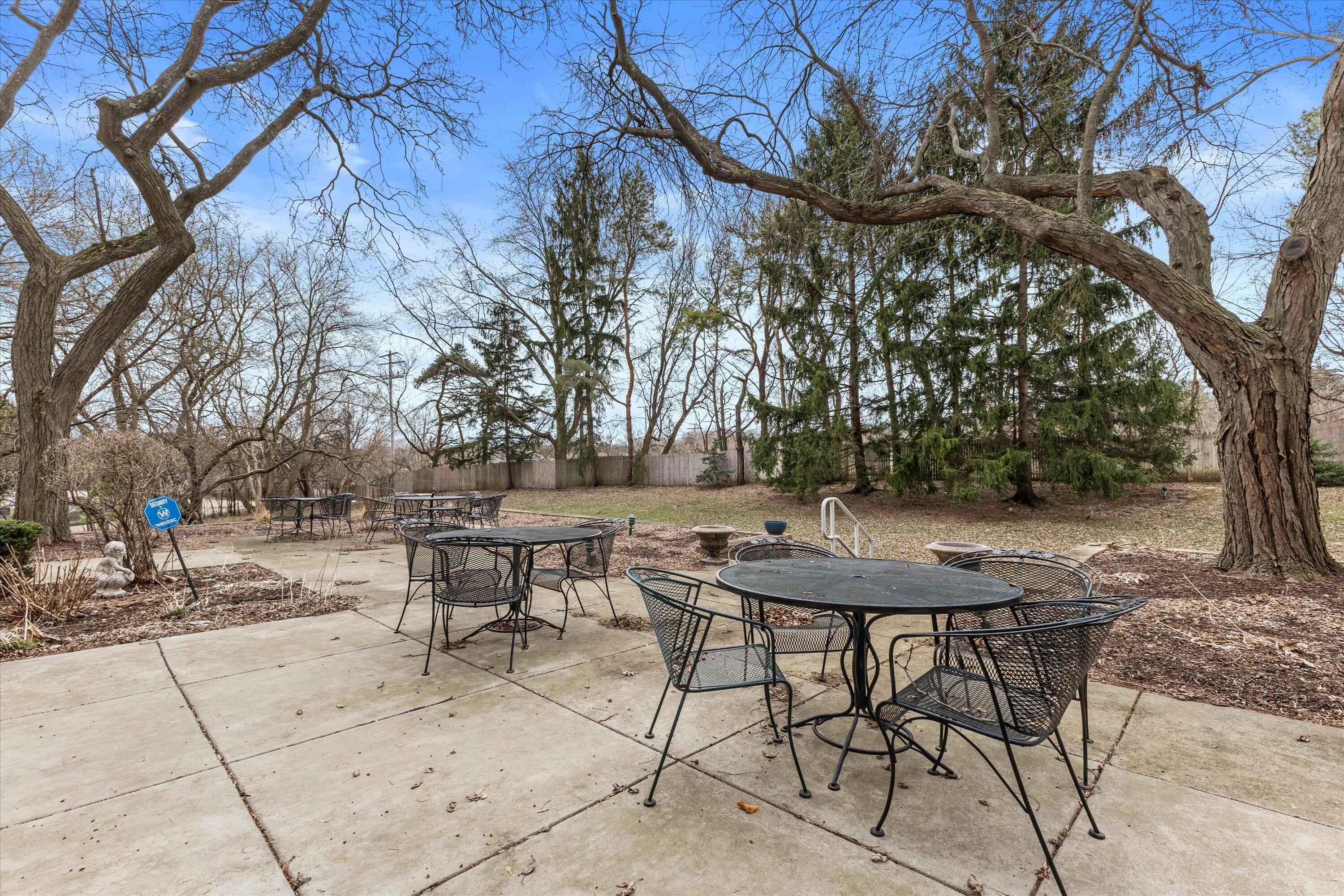 13335 Watertown Plank Road, Unit 105 Elm Grove, WI 53122 - Photo 25 of 37 back patio