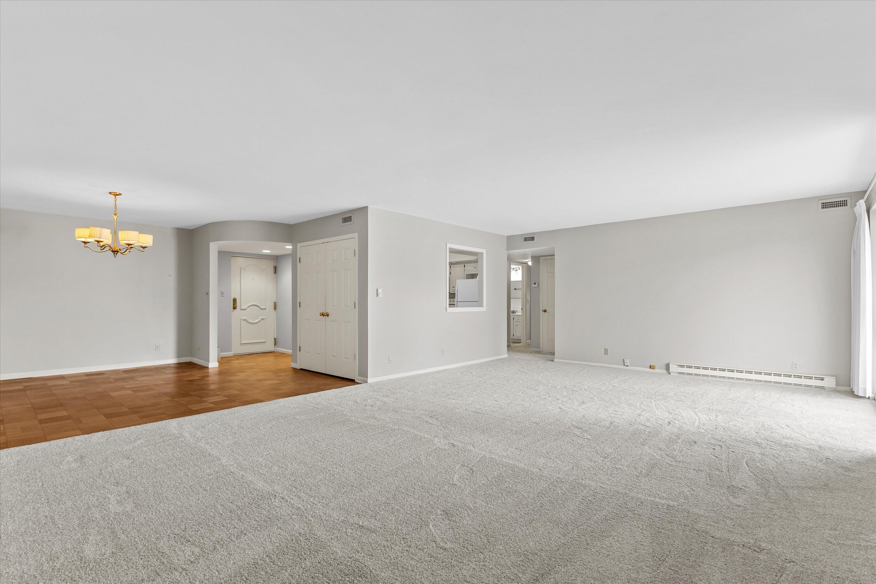 13335 Watertown Plank Road, Unit 105 Elm Grove, WI 53122 - Photo 7 of 37 living room into dining room
