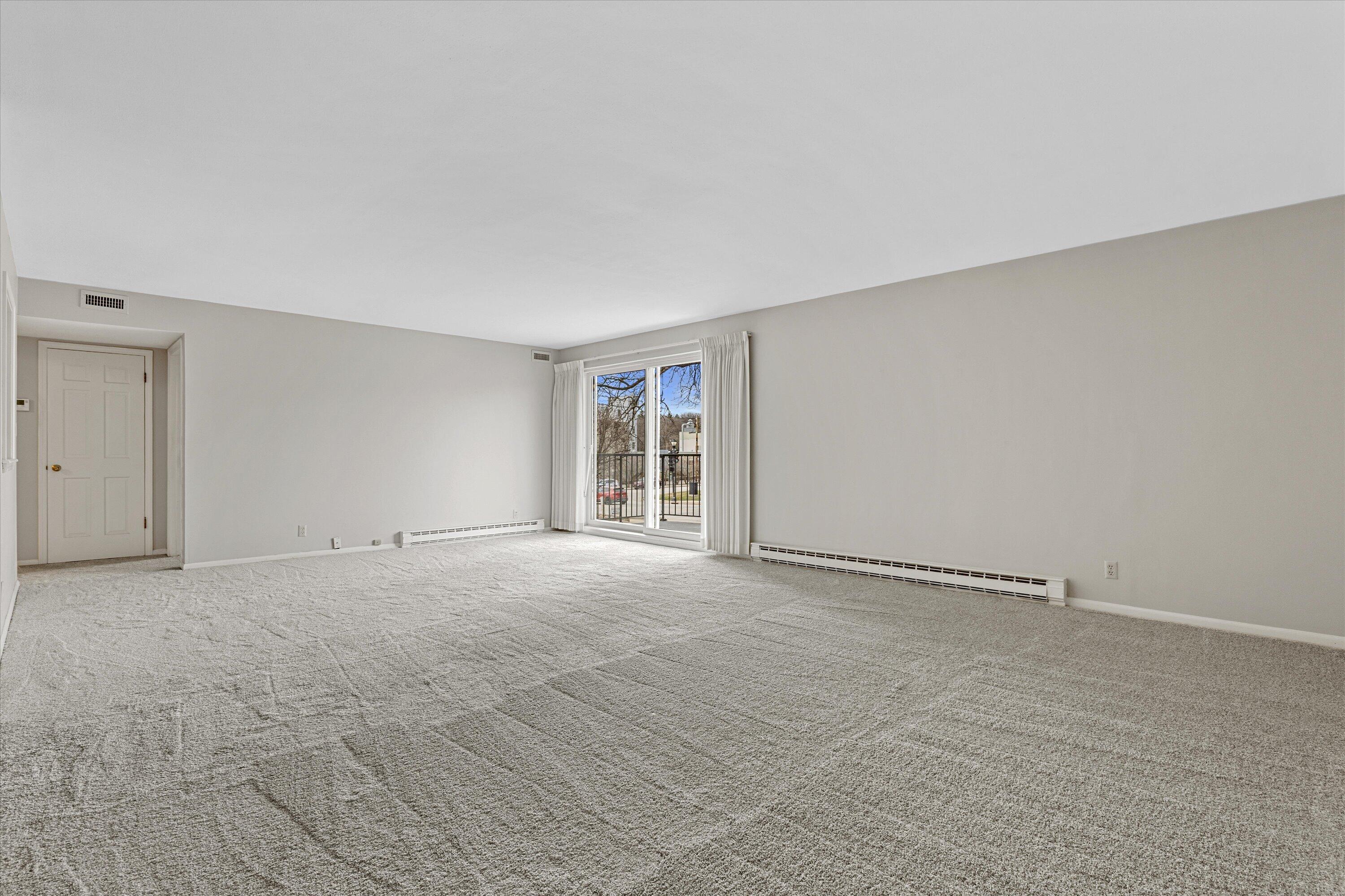 13335 Watertown Plank Road, Unit 105 Elm Grove, WI 53122 - Photo 8 of 37 living room