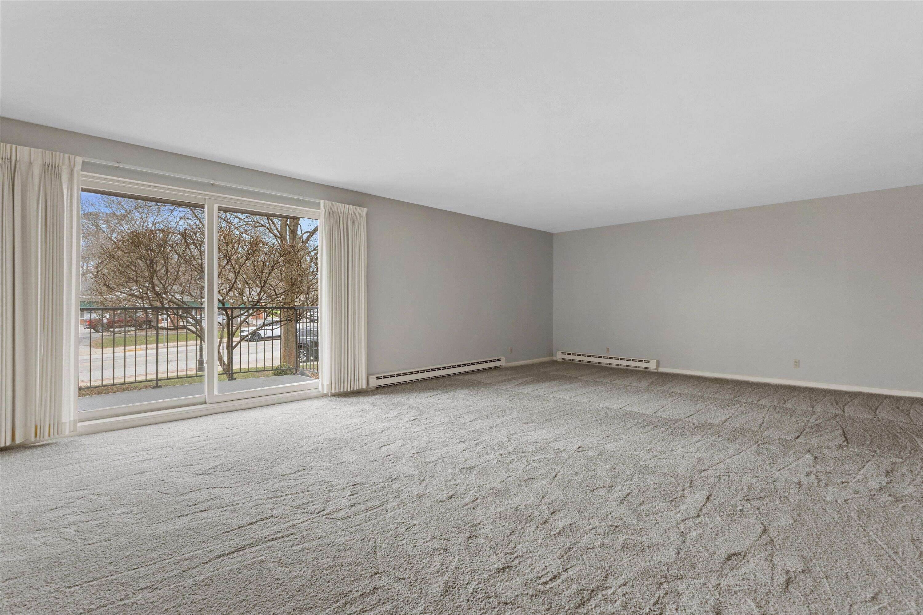 13335 Watertown Plank Road, Unit 105 Elm Grove, WI 53122 - Photo 9 of 37 living room