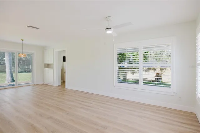 a kitchen with a refrigerator and countertop