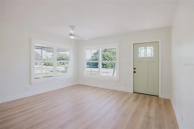 a kitchen with a refrigerator and countertop
