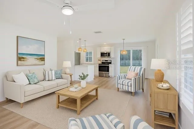 a living room with furniture and a table