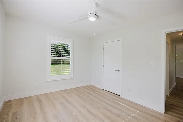a front view of house with yard and outdoor seating