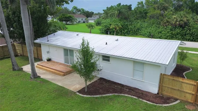 a house view with a garden space