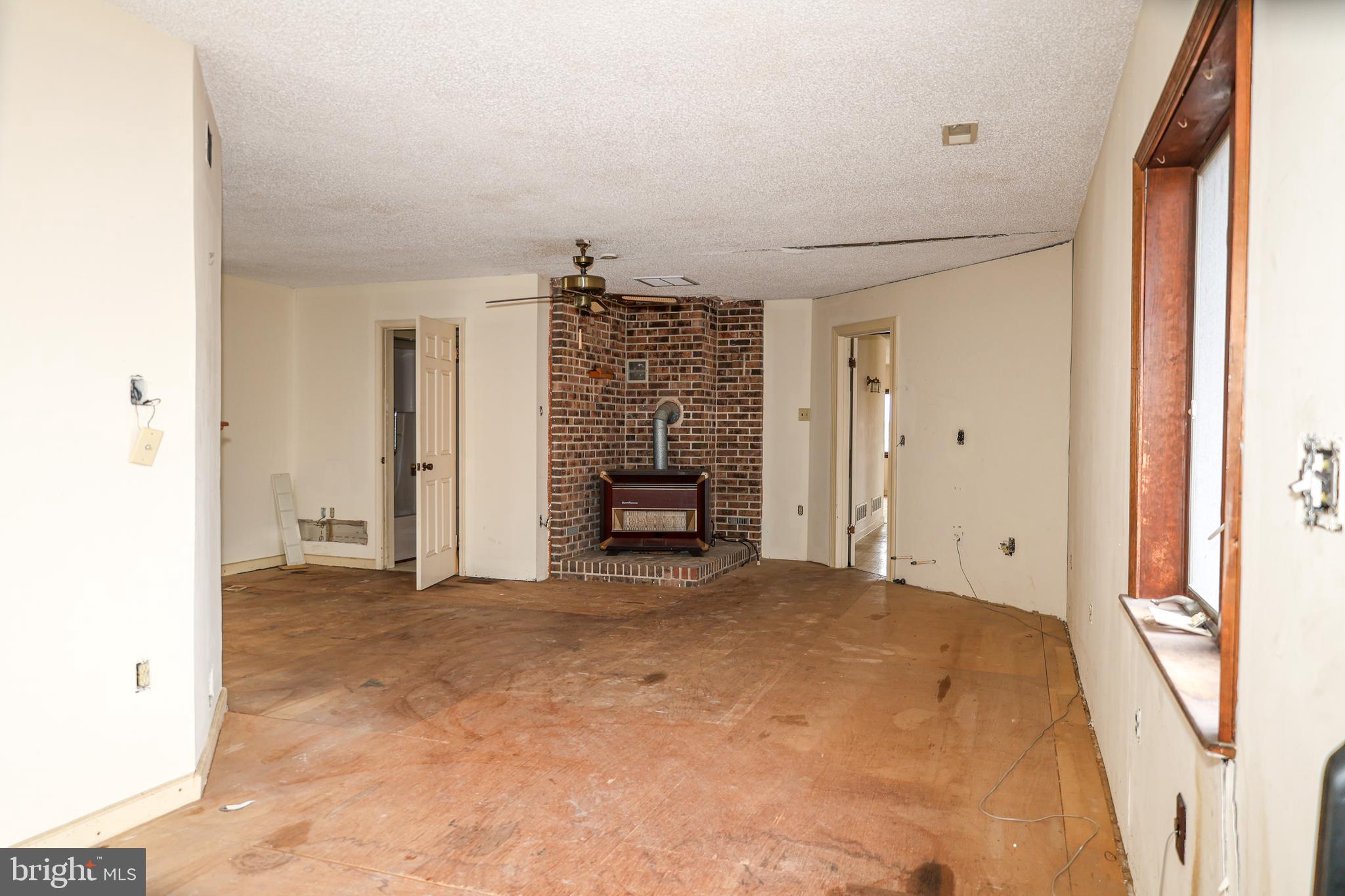 4404 South Bowers Road Milford, DE 19963 - Photo 26 of 53 a view of an empty room with stairs