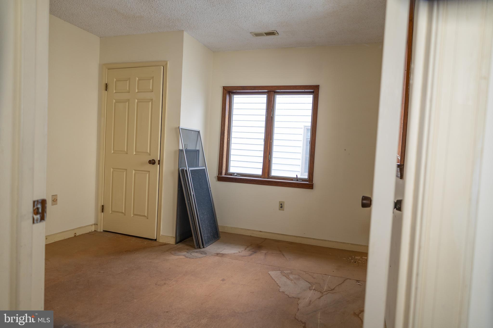 4404 South Bowers Road Milford, DE 19963 - Photo 29 of 53 an empty room with windows
