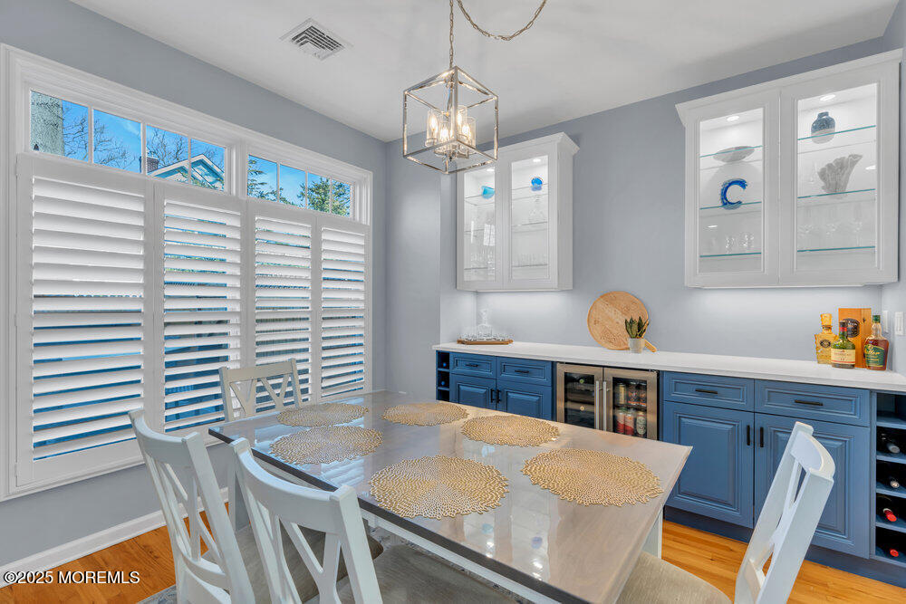 162 Main Street Manasquan, NJ 08736 - Photo 18 of 52 a view of a dining room with furniture and window