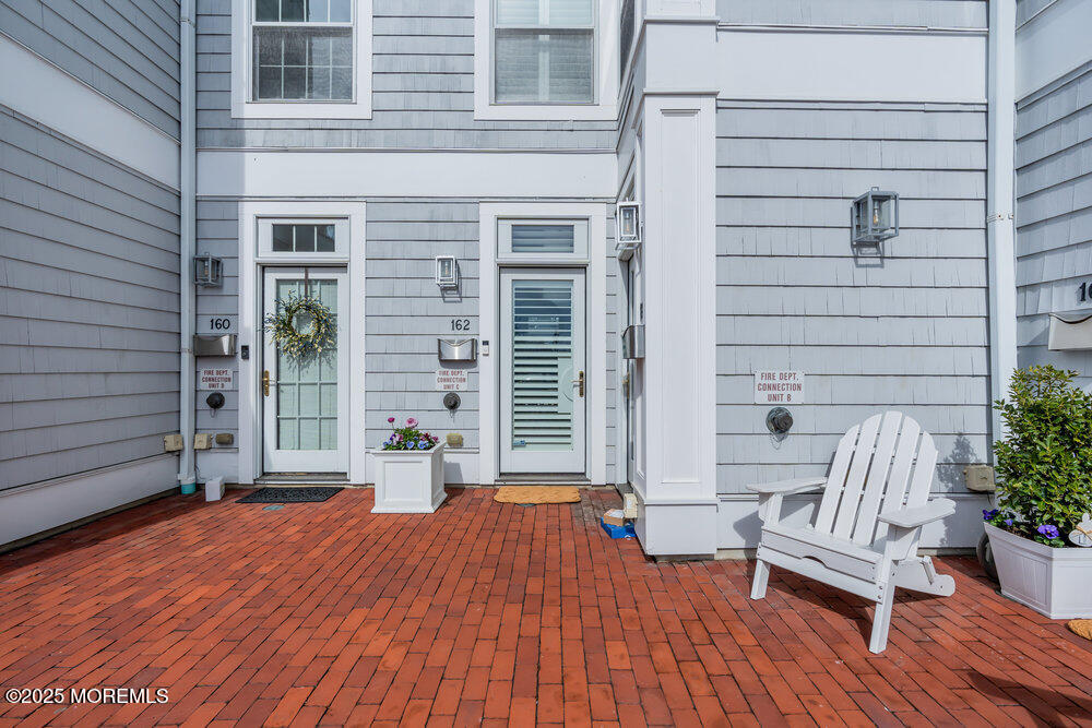 162 Main Street Manasquan, NJ 08736 - Photo 3 of 52 a view of outdoor space with seating space
