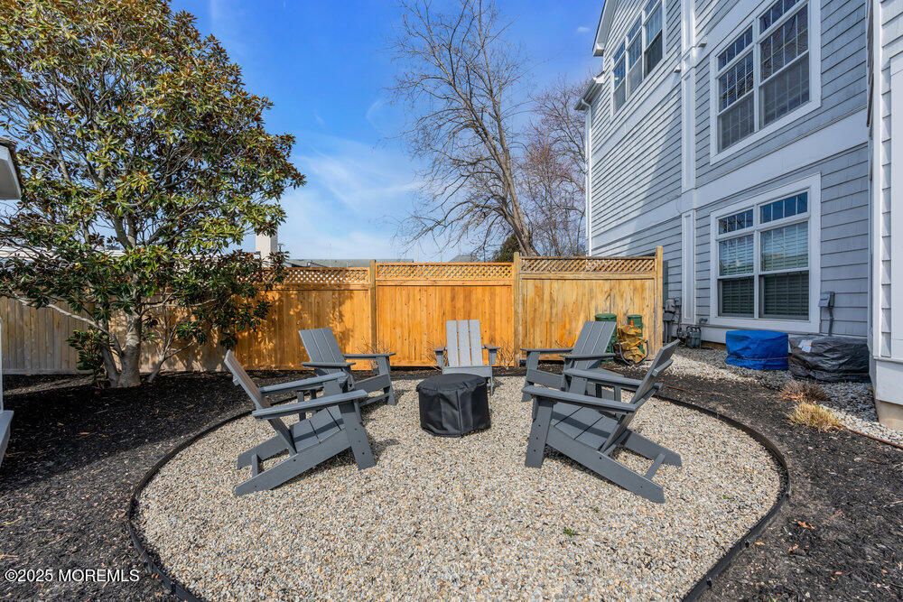162 Main Street Manasquan, NJ 08736 - Photo 40 of 52 a building outdoor space with patio furniture
