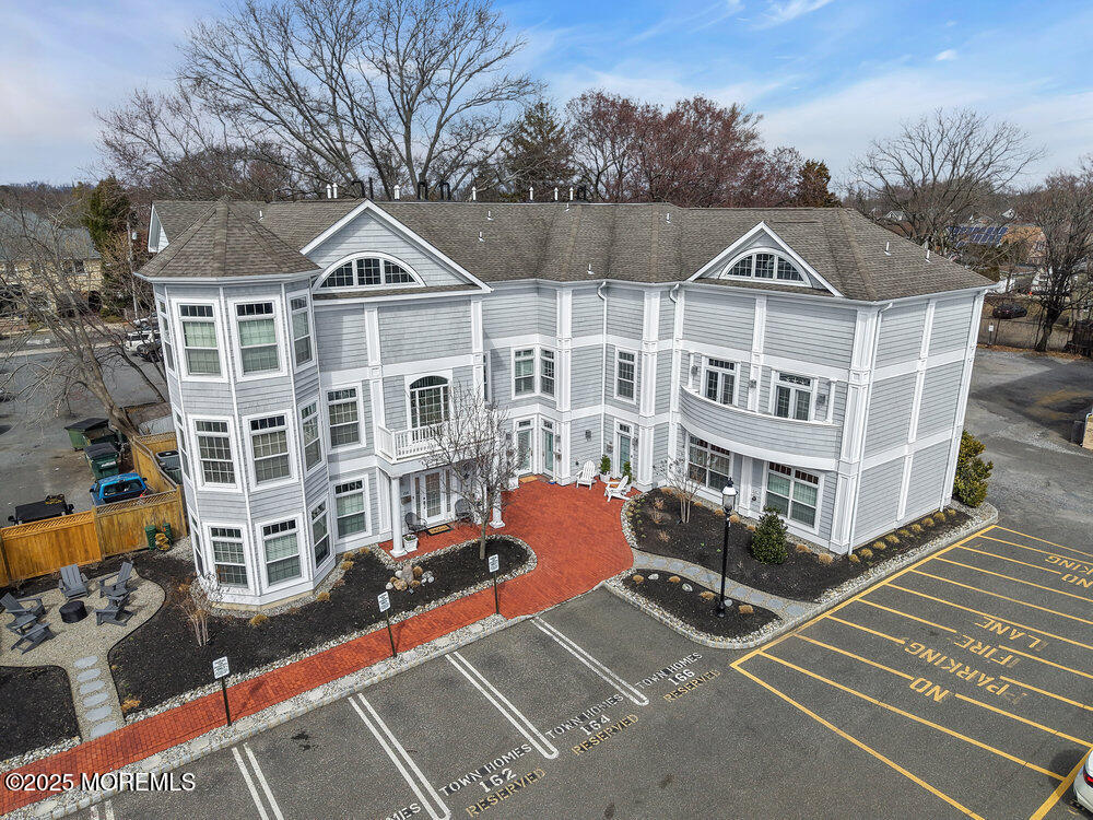 162 Main Street Manasquan, NJ 08736 - Photo 50 of 52 a view of a white building among the street