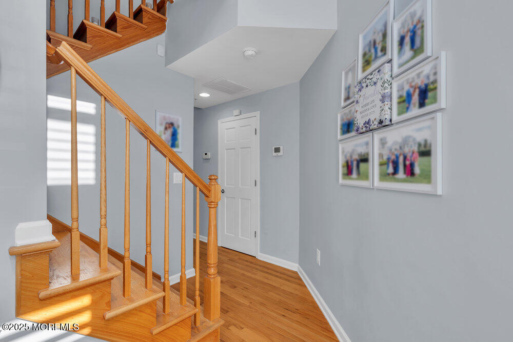 162 Main Street Manasquan, NJ 08736 - Photo 5 of 52 a view of staircase with large window