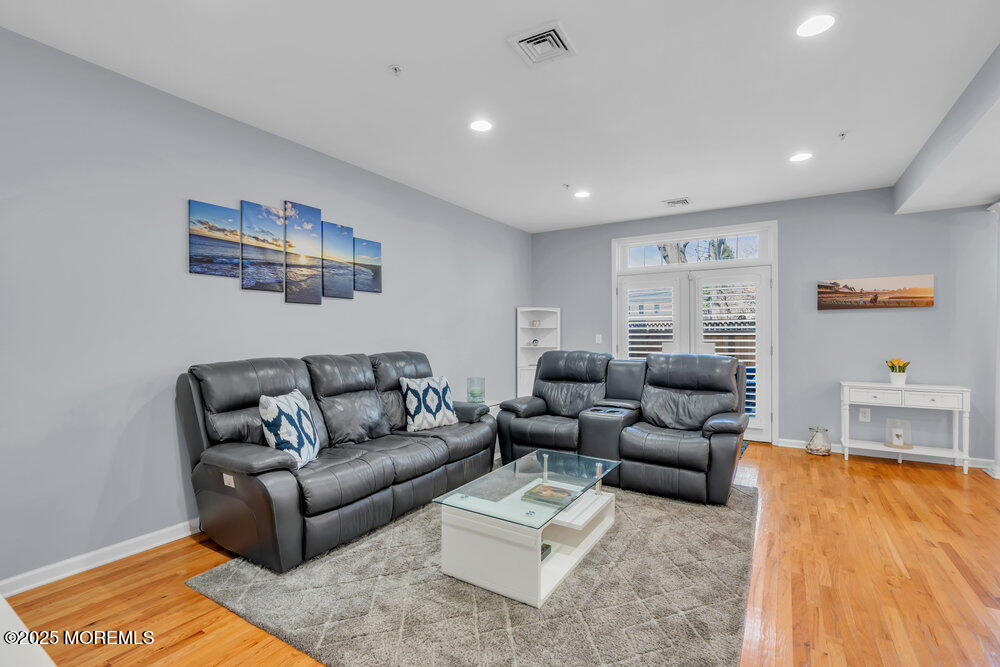 162 Main Street Manasquan, NJ 08736 - Photo 7 of 52 a living room with furniture and a couch