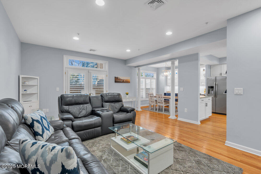 162 Main Street Manasquan, NJ 08736 - Photo 9 of 52 a living room with furniture and a window