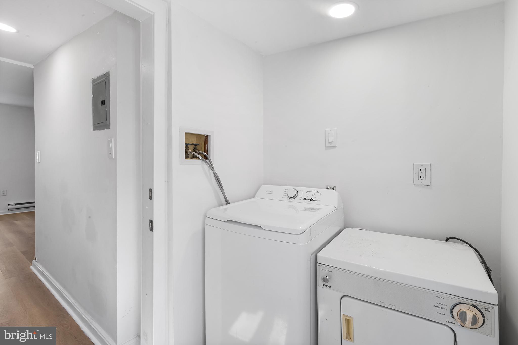 2120 Christian Street, Unit 2 Philadelphia, PA 19146 - Photo 9 of 10 a utility room with dryer and washer