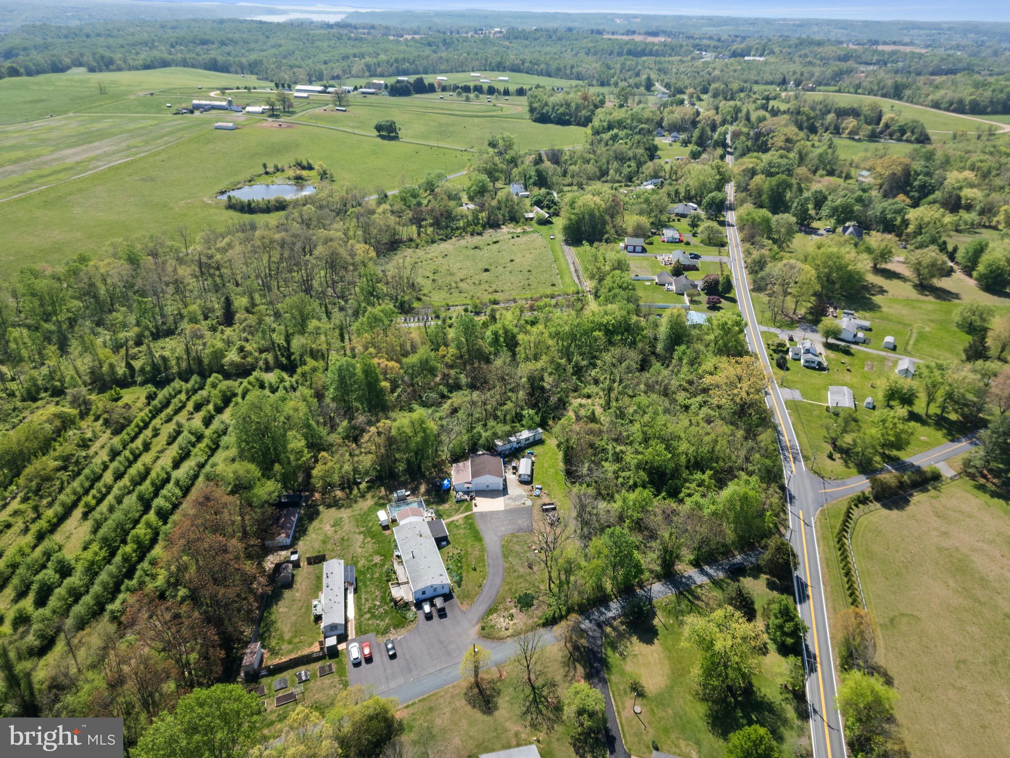 2302 Castleton Road Darlington, MD 21034 - Photo 9 of 14 an aerial view of residential houses with outdoor space and river
