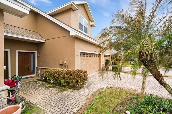 a view of a house with a patio