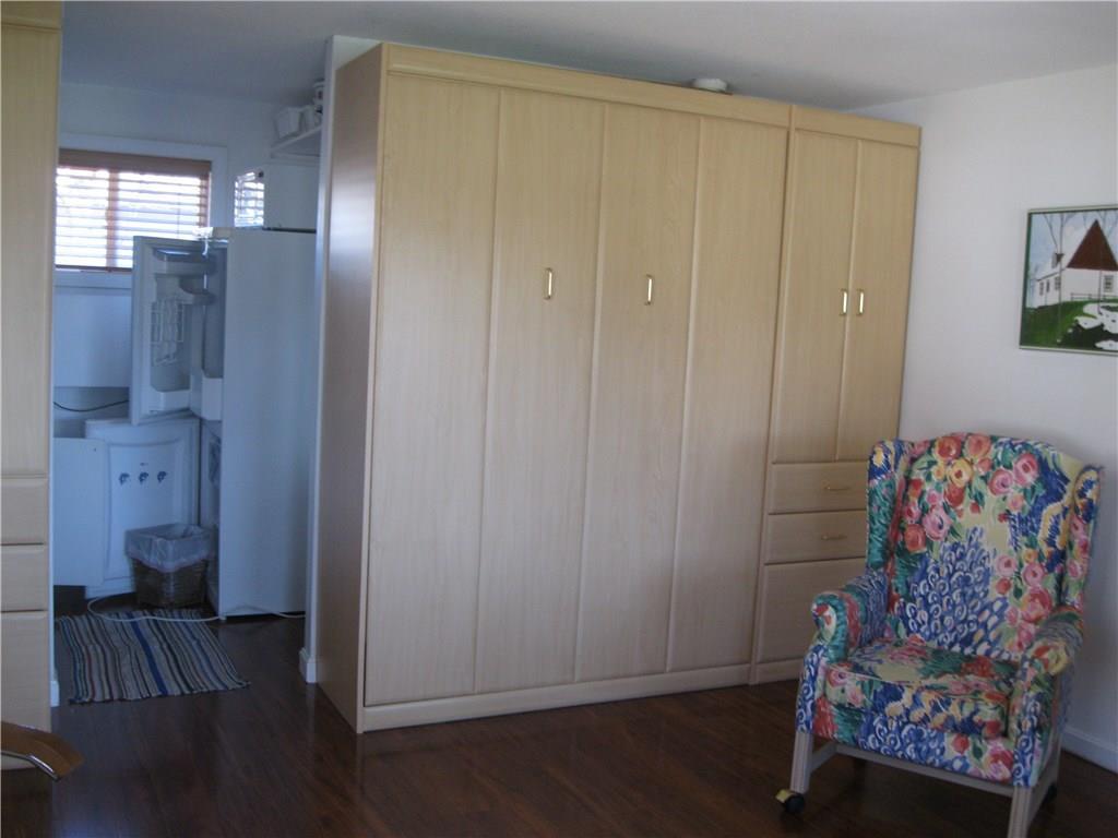 76 Post Road, Unit 21 Wells, ME 04090 - Photo 8 of 16 Murphy bed allows for more usable...