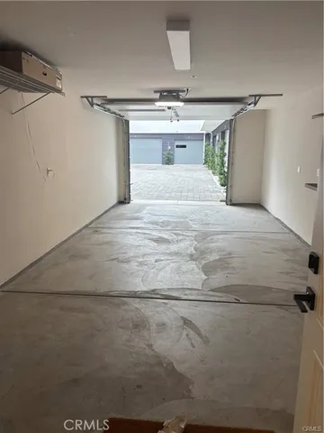 a bedroom with a bed and a walk in closet