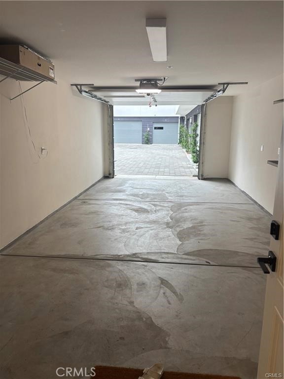 16175 Dawn Way, Unit 108 Tustin, CA 92782 - Photo 11 of 12 a bedroom with a bed and a walk in closet