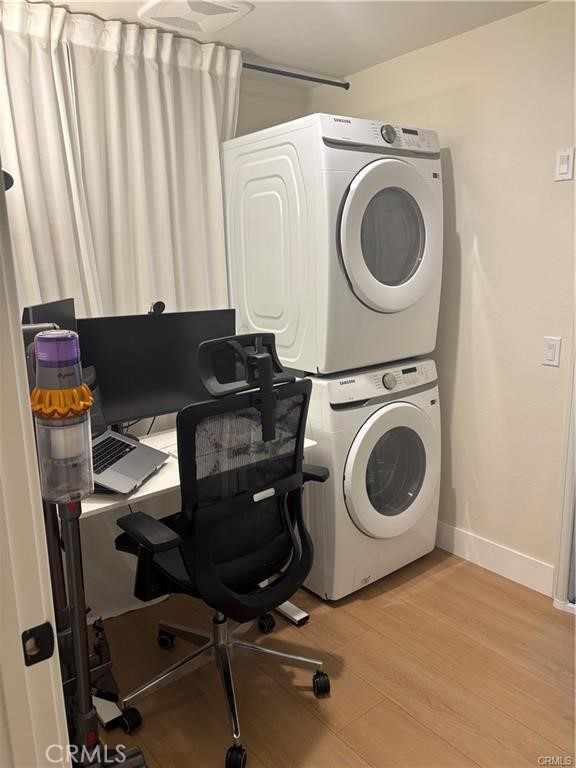 16175 Dawn Way, Unit 108 Tustin, CA 92782 - Photo 10 of 12 a view of a storage and utility room with washer and dryer