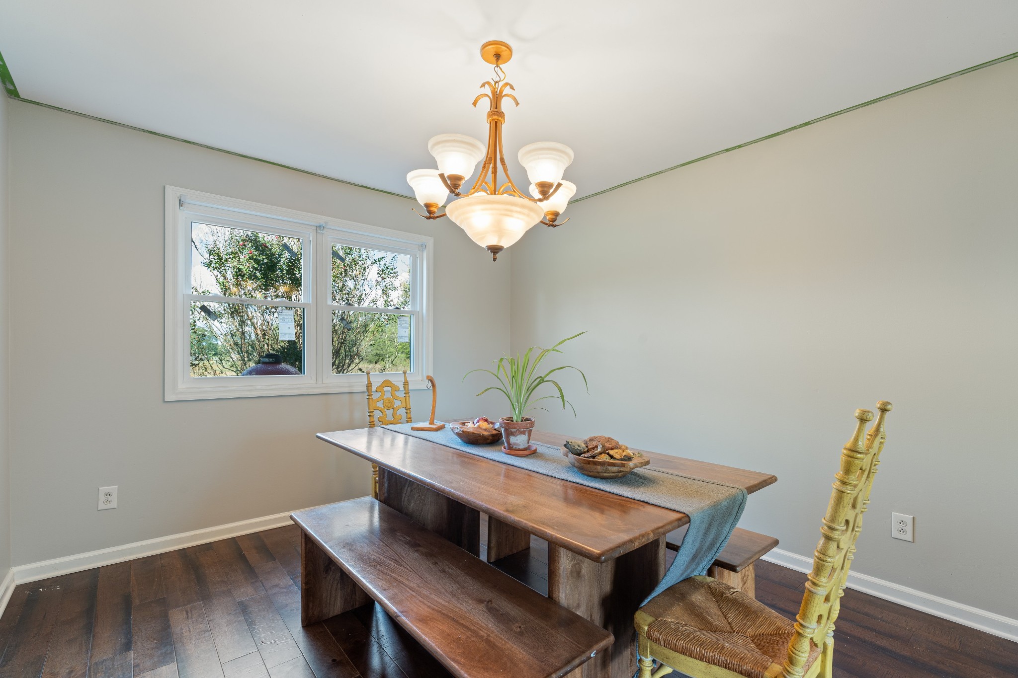 330 John Shaw Road Lewisburg, TN 37091 - Photo 20 of 41 a view of a dining room with furniture a chandelier and wooden floor