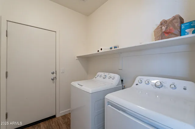 a utility room with dryer and washer