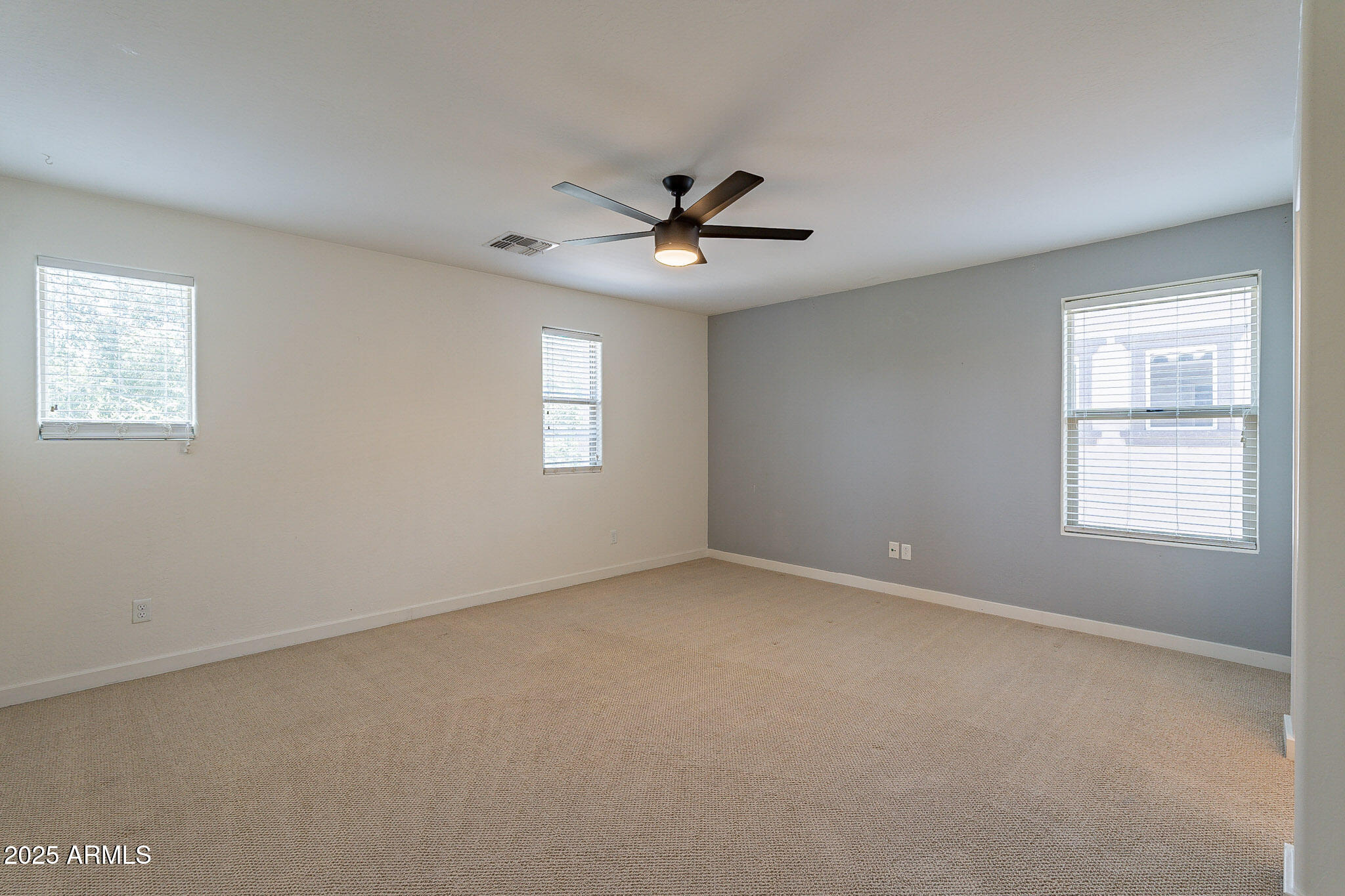 1061 South Hawk Lane Gilbert, AZ 85296 - Photo 14 of 23 a view of an empty room with a window
