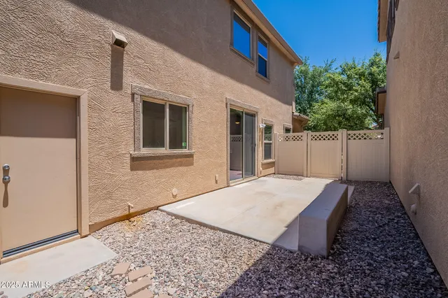 a house view with a backyard