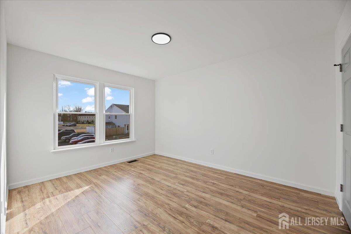 13 Lamont Court Sicklerville, NJ 08081 - Photo 20 of 25 an empty room with a window