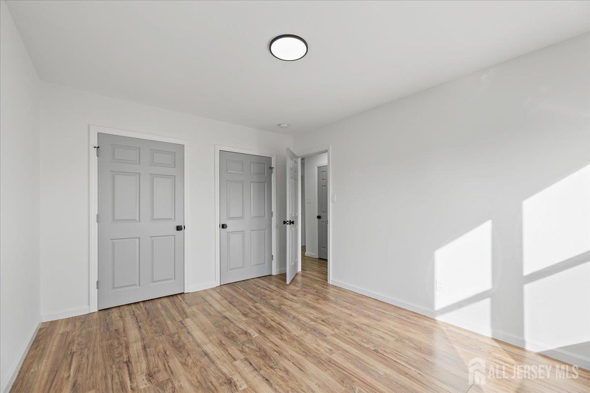 13 Lamont Court Sicklerville, NJ 08081 - Photo 21 of 25 a view of a room with wooden floor and bathroom