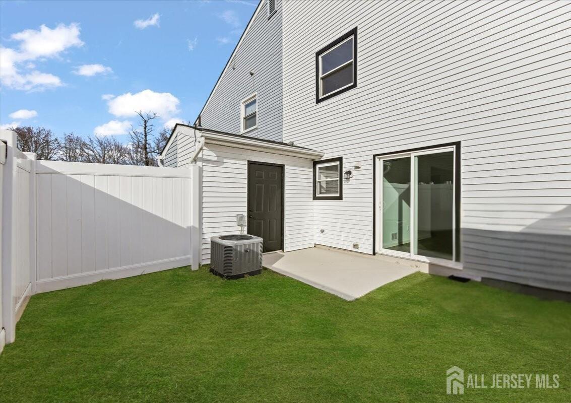 13 Lamont Court Sicklerville, NJ 08081 - Photo 24 of 25 a backyard of a house with table and chairs