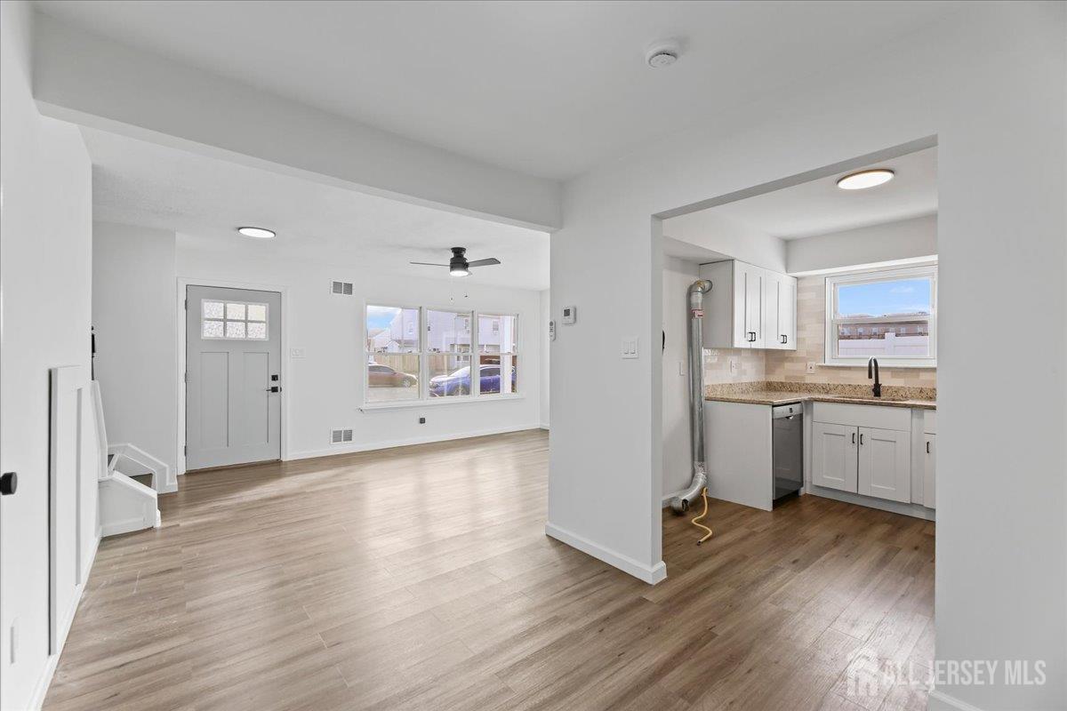 13 Lamont Court Sicklerville, NJ 08081 - Photo 10 of 25 a view of kitchen with wooden floor and electronic appliances