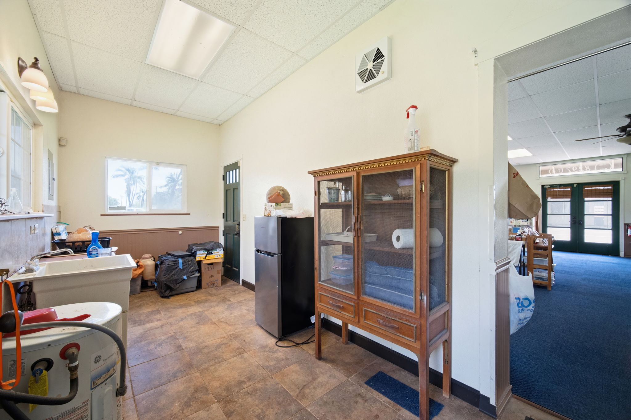 8297 Kekaha Road Kekaha, HI 96752 - Photo 12 of 27 a view of a room with lots of stuff and hardwood floor