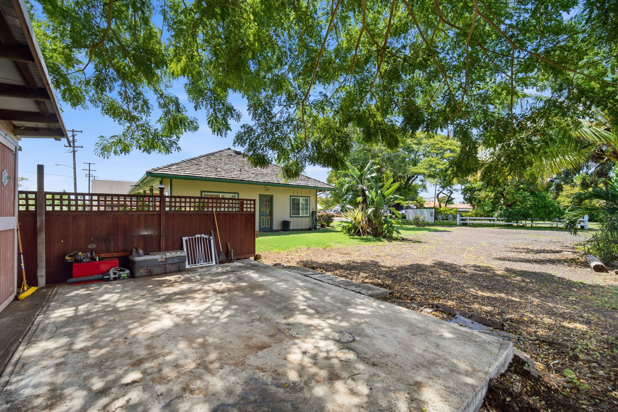 8297 Kekaha Road Kekaha, HI 96752 - Photo 16 of 27 a view of outdoor space with wooden fence