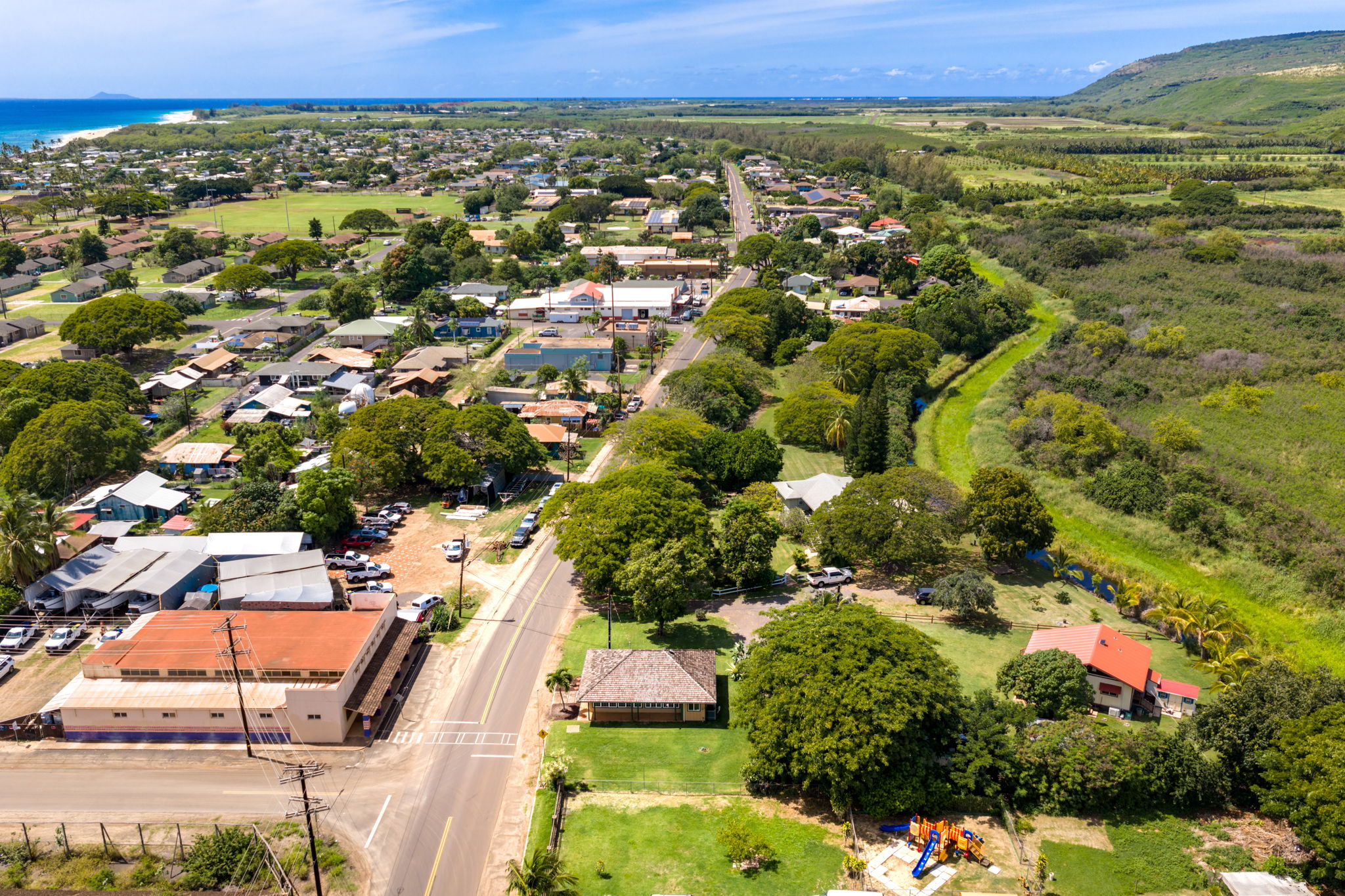 8297 Kekaha Road Kekaha, HI 96752 - Photo 23 of 27 an aerial view of residential houses with outdoor space and trees