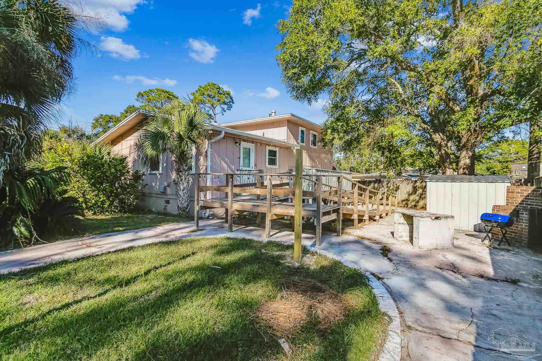 6 Ruffin Circle Pensacola, FL 32503 - Photo 36 of 42 a view of a house with backyard porch and sitting area