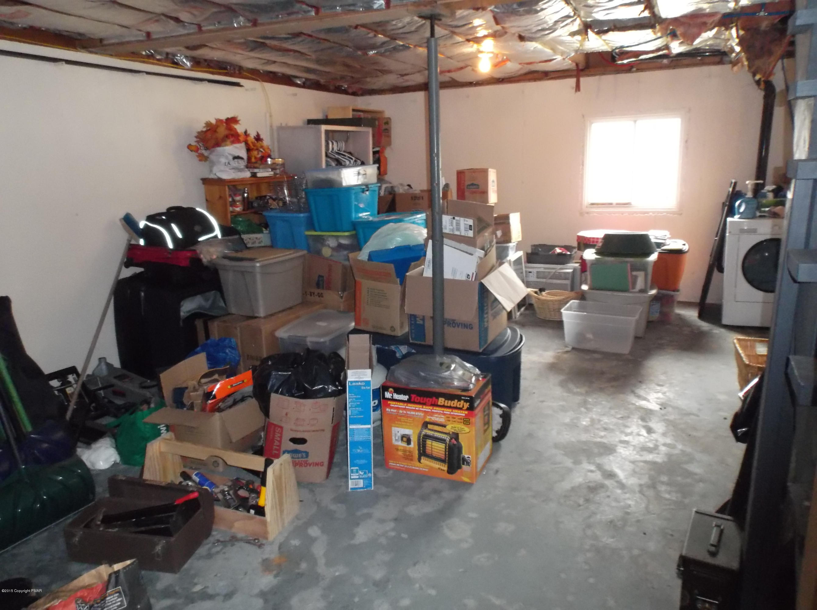 3430 Walnut Road Kunkletown, PA 18058 - Photo 11 of 16 a room with gym equipment and a flat screen tv