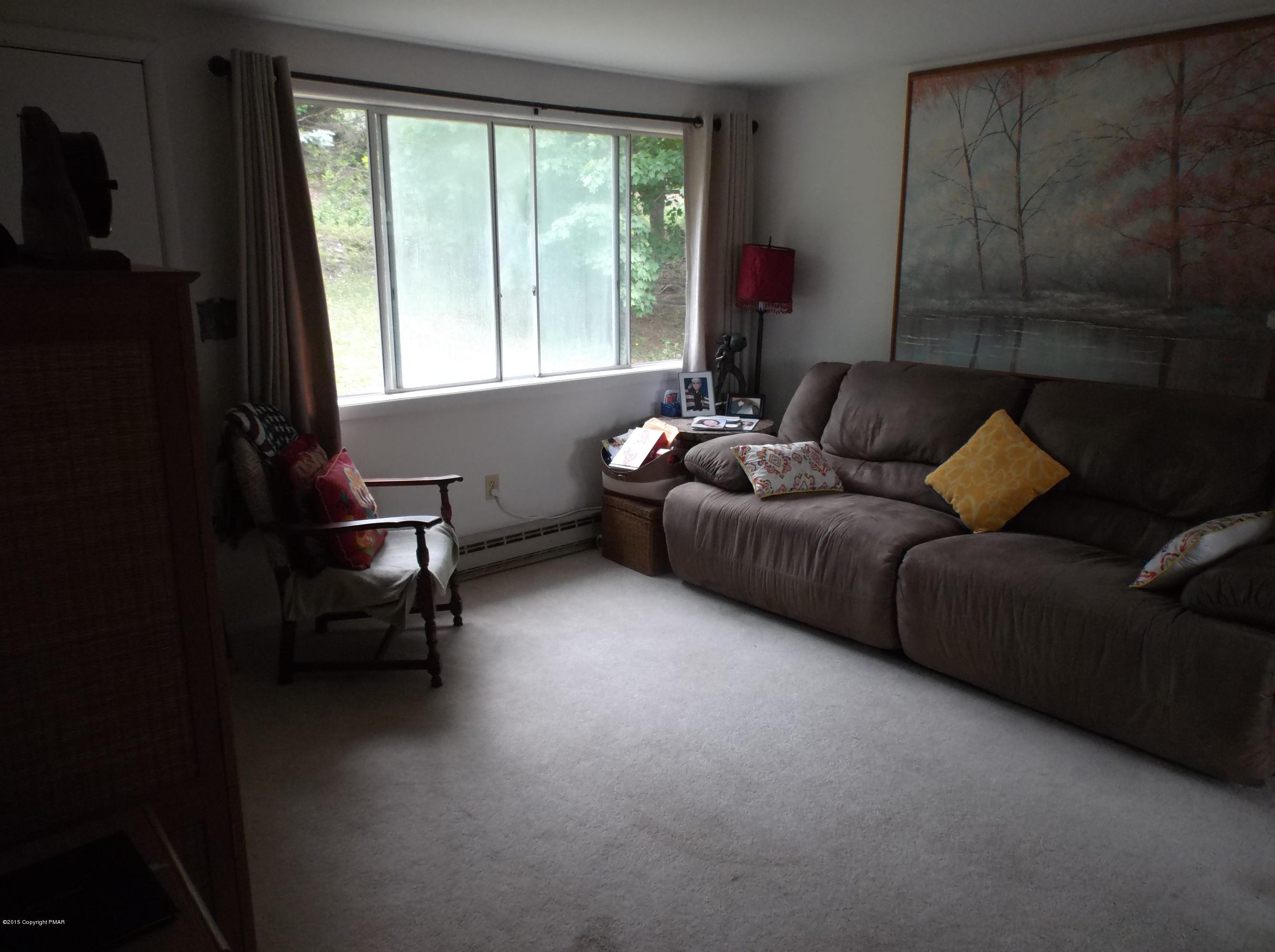 3430 Walnut Road Kunkletown, PA 18058 - Photo 12 of 16 a living room with furniture and a window
