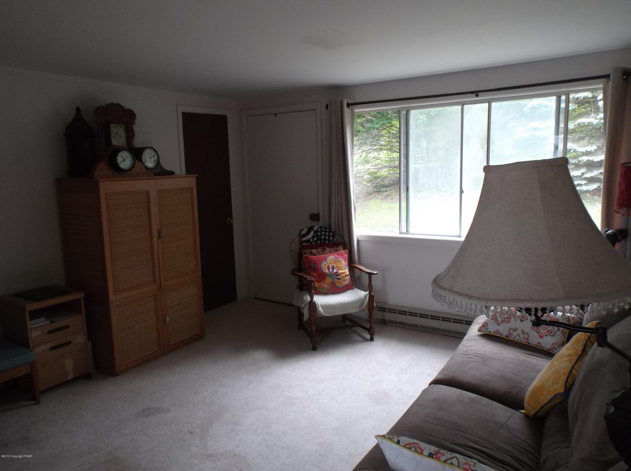 3430 Walnut Road Kunkletown, PA 18058 - Photo 4 of 16 a living room with furniture and a window