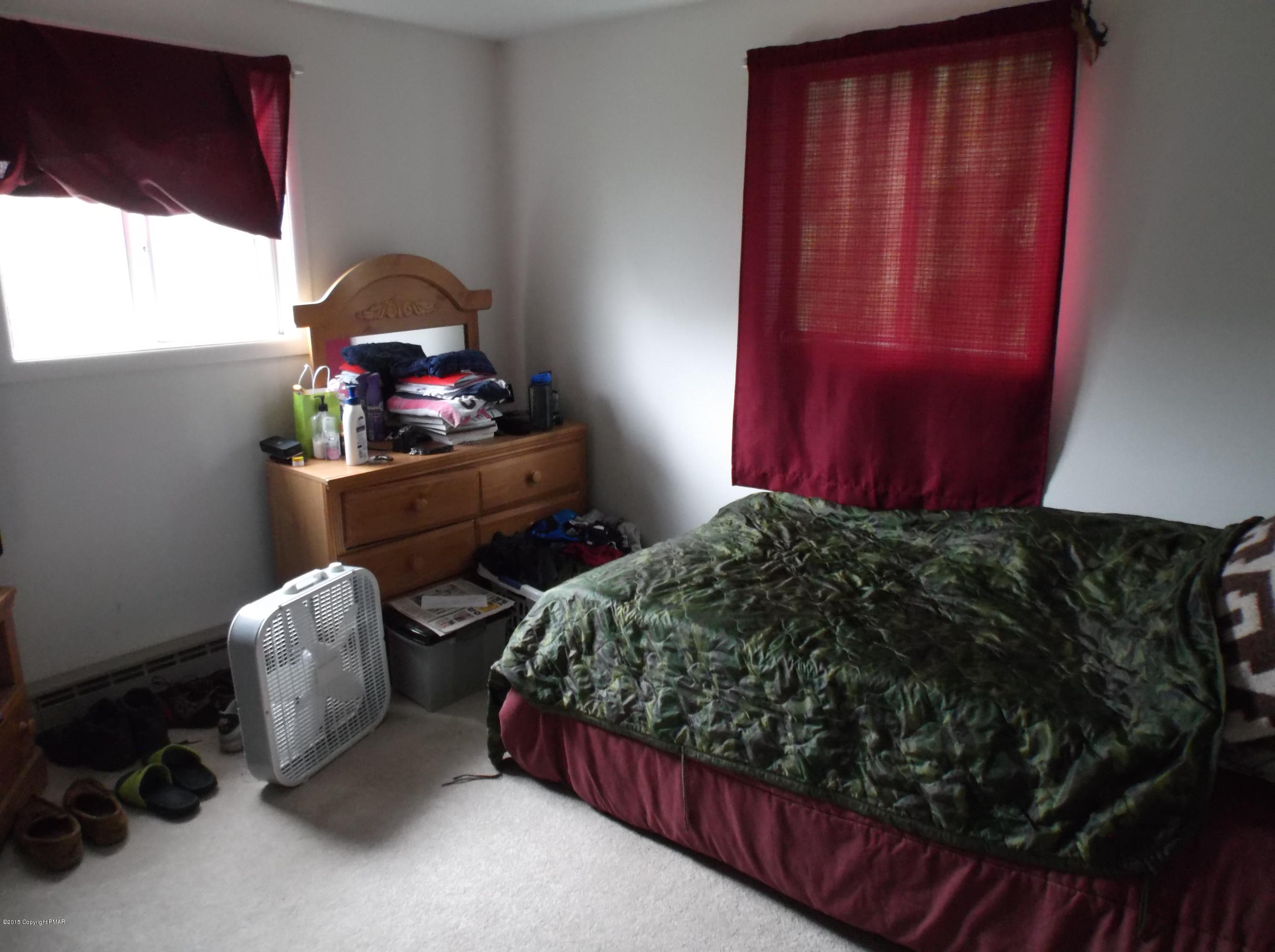 3430 Walnut Road Kunkletown, PA 18058 - Photo 8 of 16 a bedroom with furniture and a window