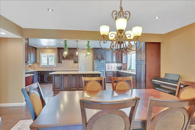 a bedroom with a bed and a ceiling fan