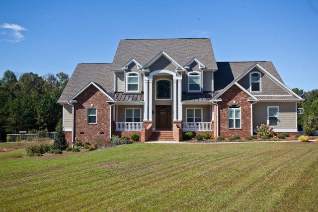 1001 Jenkins Road Forsyth, GA 31029 - Photo 1 of 1 a front view of a house with a yard