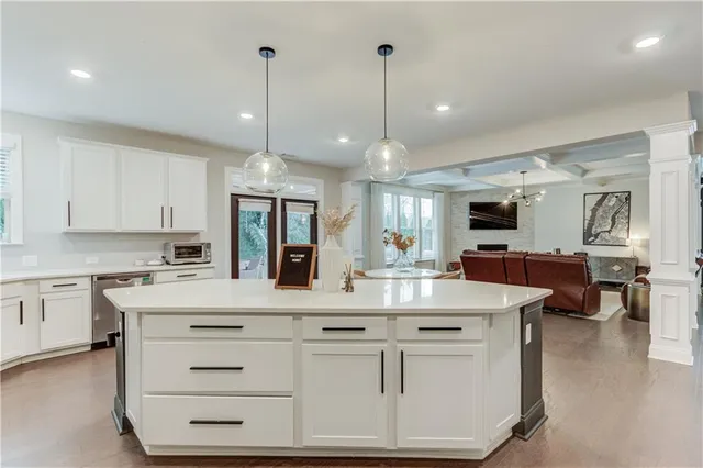 a bathroom with a sink toilet tub and shower