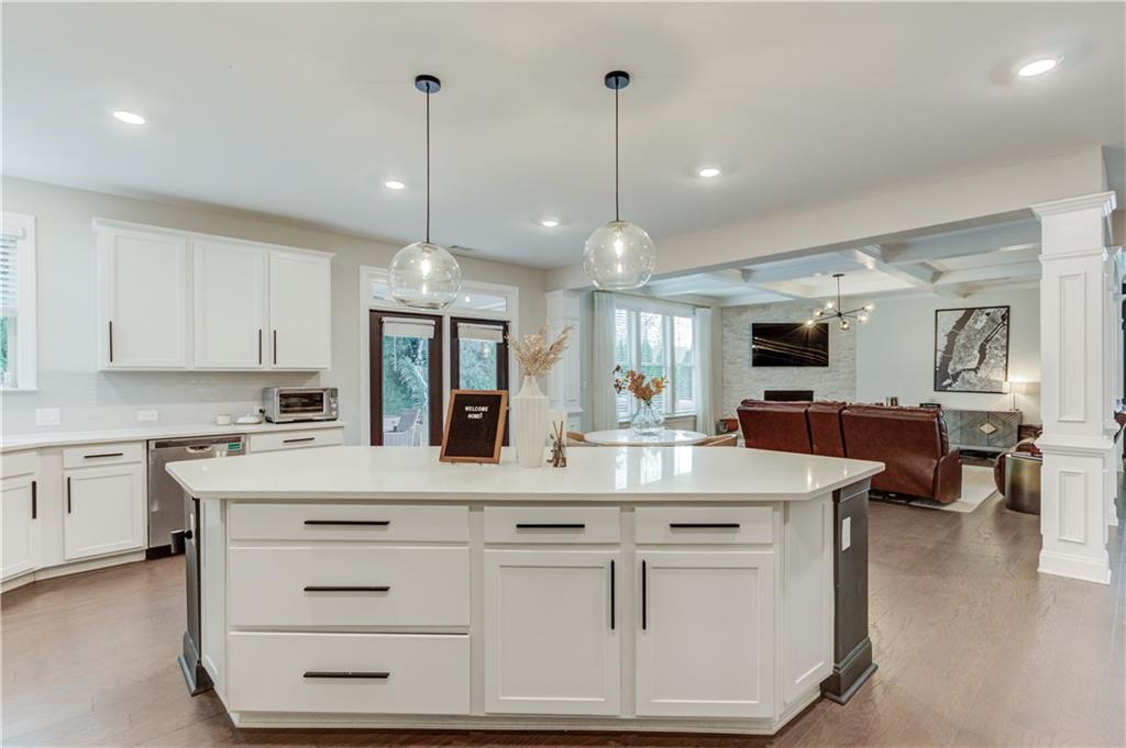 542 Flyingbolt Run Canton, GA 30115 - Photo 17 of 55 a view of a kitchen counter top space with granite countertop stainless steel appliances