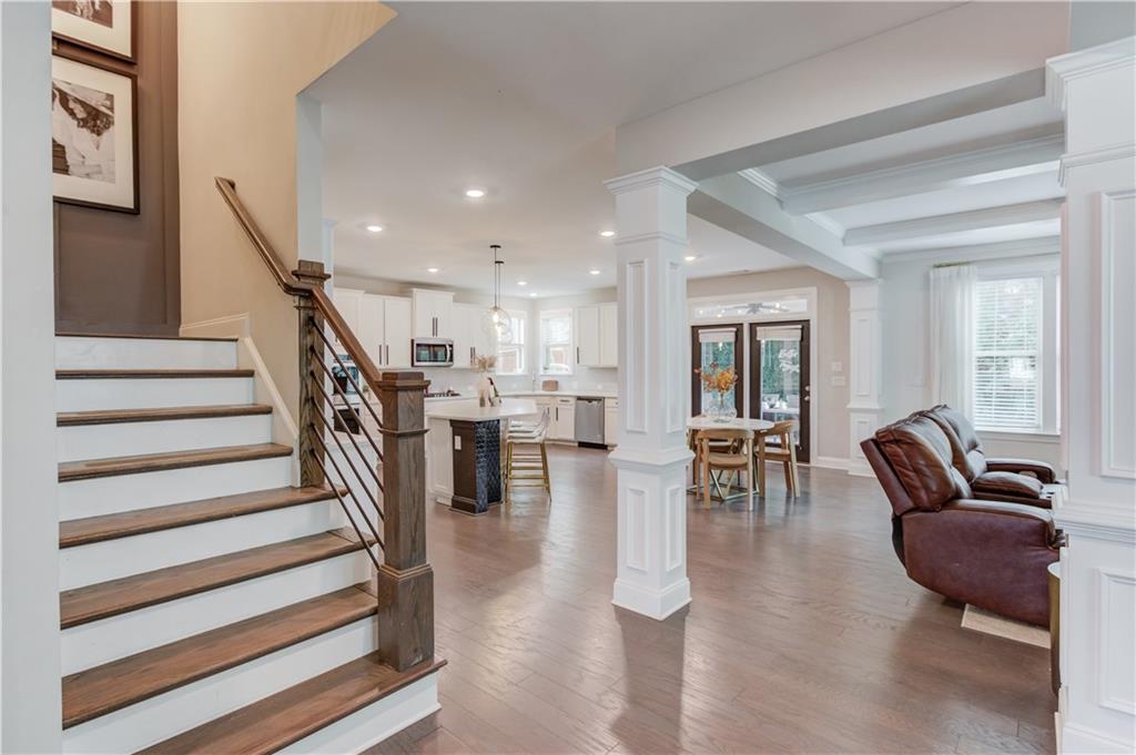 542 Flyingbolt Run Canton, GA 30115 - Photo 20 of 55 a living room with furniture and wooden floor