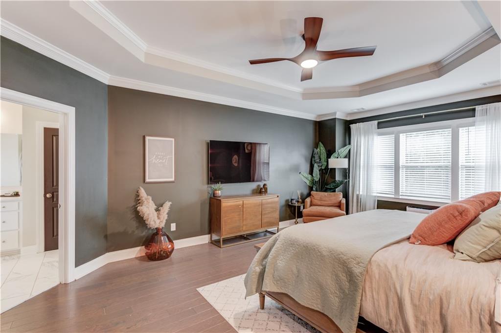 542 Flyingbolt Run Canton, GA 30115 - Photo 23 of 55 a bedroom with bed and a large window